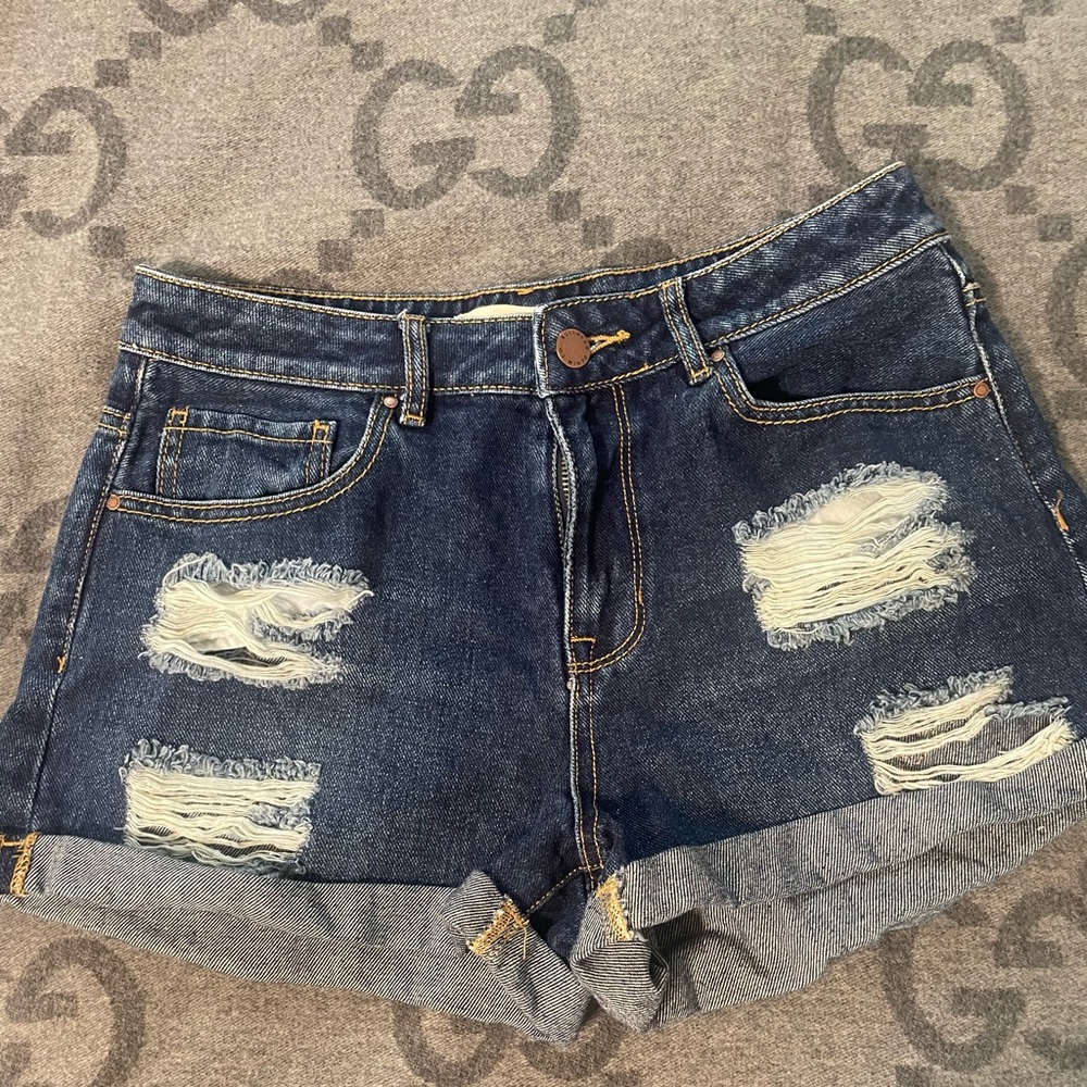 Distressed Denim Shorts.